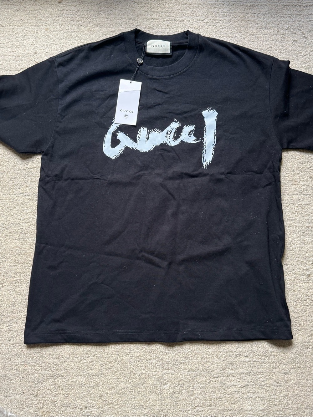 Gucci Black Short-Sleeve Tee with White Brushstroke Logo